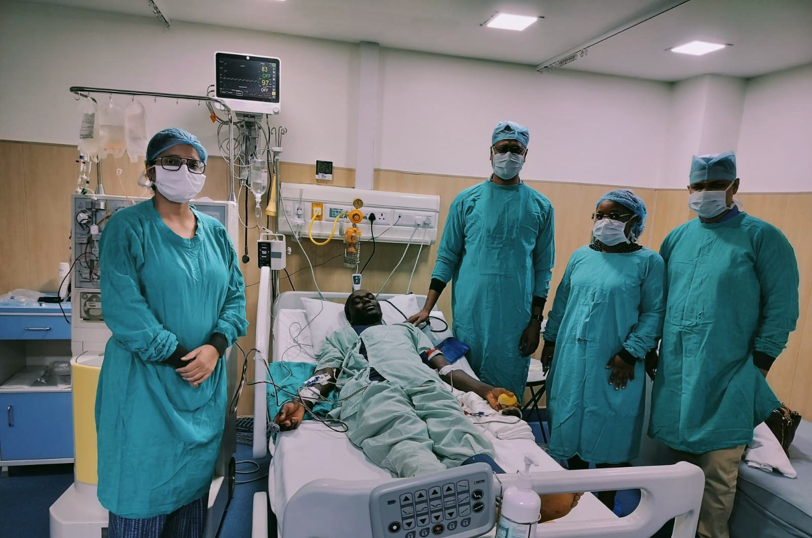 The medical team at a patient's bedside, Greater Noida